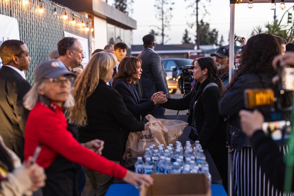 An image of Kamala Harris talking to locals